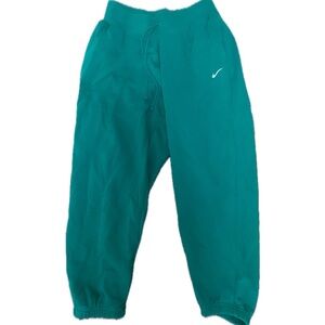 L Nike green joggers